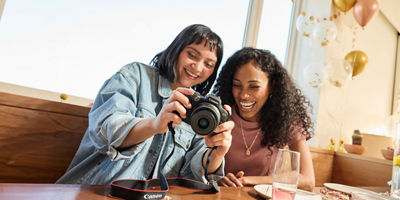 People Viewing Pictures on EOS Camera